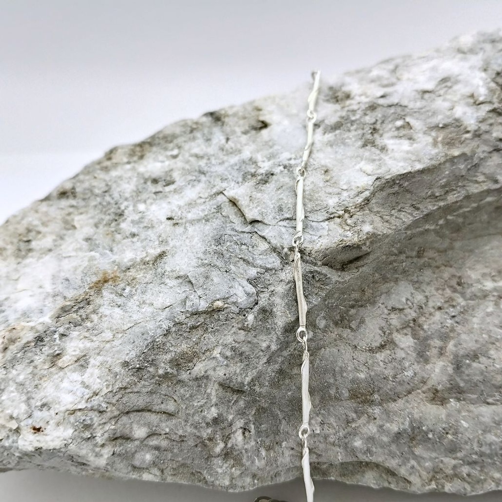 De draad volgen - Gelede armband